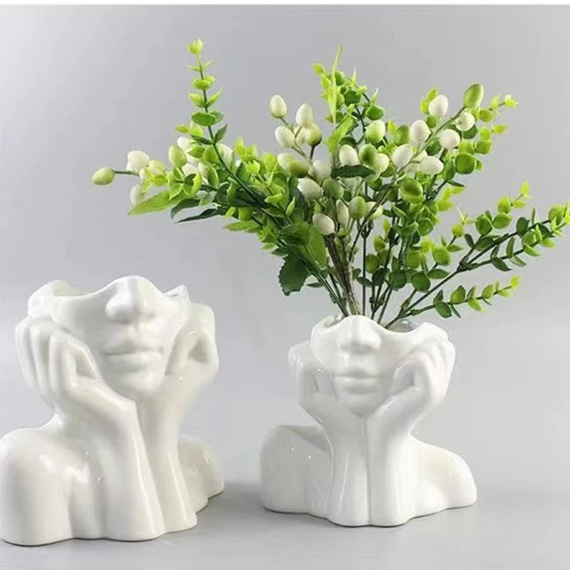 Vaso Escultura Feminina, Vaso Decorativo, Vaso de Resina, Vaso Artístico, Escultura Feminina, Vaso Moderno, Vaso de Design, Decoração Sofisticada, Vaso para Sala, Vaso para Escritório, Vaso para Jardim, Obra de Arte em Vaso, Decoração Contemporânea, Peça Decorativa Feminina, Arte para Casa, Vaso Elegante, Vaso para Plantas, Vaso de Rosto Feminino, Vaso Abstrato, Decoração para Ambientes Modernos, Vaso para Varanda, Escultura Decorativa Feminina, Decoração de Luxo, Vaso Criativo, Vaso Estilizado-Loja Bratta