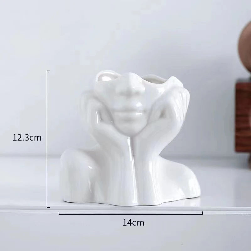 Vaso Escultura Feminina, Vaso Decorativo, Vaso de Resina, Vaso Artístico, Escultura Feminina, Vaso Moderno, Vaso de Design, Decoração Sofisticada, Vaso para Sala, Vaso para Escritório, Vaso para Jardim, Obra de Arte em Vaso, Decoração Contemporânea, Peça Decorativa Feminina, Arte para Casa, Vaso Elegante, Vaso para Plantas, Vaso de Rosto Feminino, Vaso Abstrato, Decoração para Ambientes Modernos, Vaso para Varanda, Escultura Decorativa Feminina, Decoração de Luxo, Vaso Criativo, Vaso Estilizado-Loja Bratta